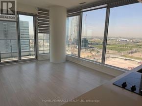 Vaughan (Vaughan Corporate Centre) condo for rent - A room with a view of a construction site through the windows.