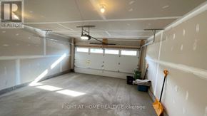 Ottawa apartment for rent - A room under construction with a brokerage sign on the wall.