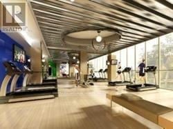 Toronto (Willowdale West) condo for rent - A gym with treadmills, elliptical machines, and a yoga mat.
