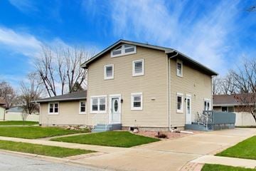 Schererville apartment for rent - A two-story house with a front porch and a garage.