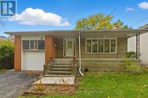 Toronto (Bayview Woods-Steeles) apartment for rent - A house with a garage and a front porch is for sale.