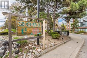 Mississauga (Cooksville) condo for rent - A sign with the number 2091 on it is displayed in front of a building.