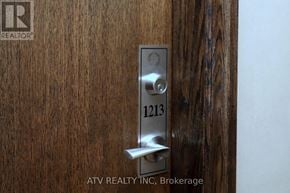 Toronto (Islington-City Centre West) condo for rent - A door handle with the number 1213 on it.