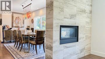 West Vancouver apartment for rent - A living room with a dining table and chairs.