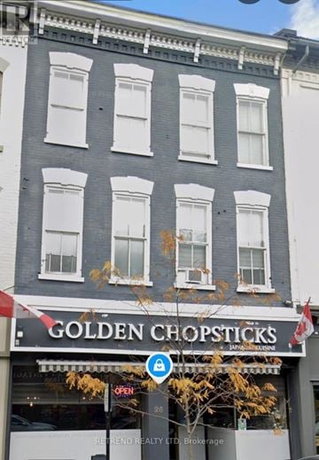 Cobourg apartment for rent - A building with a sign that says Golden Chopsticks.