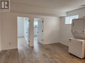 Cobourg apartment for rent - A room with a washing machine and a window.