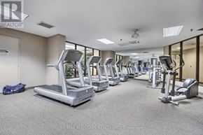 Toronto (Steeles) condo for rent - A gym with treadmills and exercise equipment.