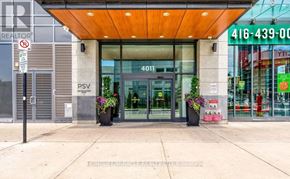 Mississauga (Creditview) condo for rent - The front of a building with a glass door and a sign that reads "4011".