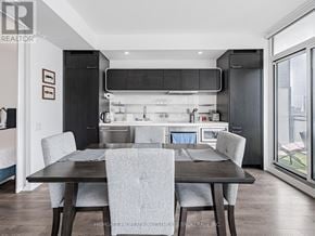 Toronto (Church-Yonge Corridor) condo for rent - A modern kitchen with a dining table and chairs.