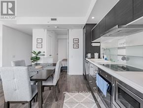 Toronto (Church-Yonge Corridor) condo for rent - A modern kitchen with a dining table and chairs.