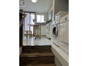 Vancouver apartment for rent - A laundry room with a washer and dryer.