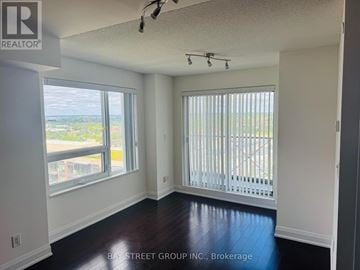 Markham (Unionville) condo for rent - A room with a view of the street through the window.