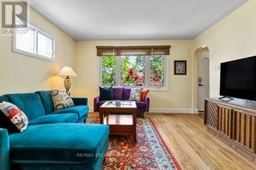 St. Catharines (Downtown) apartment for rent - A living room with a blue couch and a coffee table.