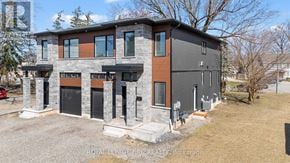 Welland (N. Welland) apartment for rent - A modern two-story house with a mix of stone and siding exterior.