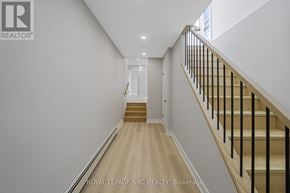 Welland (N. Welland) apartment for rent - A hallway with a staircase and a white wall.