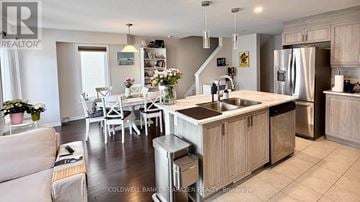 Ottawa townhouse for rent - A modern kitchen with a dining table set up.