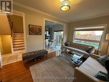 Milton (Cl Clarke) apartment for rent - A living room with a couch, coffee table, and a painting on the wall.