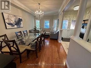 Milton (Cl Clarke) apartment for rent - A dining room with a glass table and chairs.