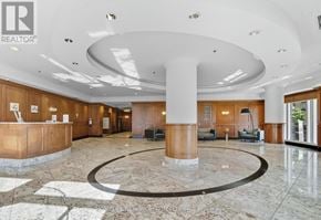 Ottawa condo for rent - A reception area with a white ceiling and a marble floor.
