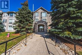 Hamilton (Meadowlands) condo for rent - A building entrance with a black railing and a red fire hydrant.