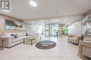 Hamilton (Meadowlands) condo for rent - A well-lit, modern office lobby with a reception desk and comfortable seating areas.