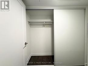 Toronto (Kensington-Chinatown) condo for rent - A white closet with a shelf and a door.
