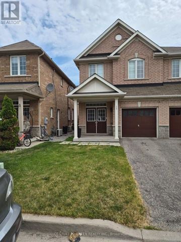 Milton (Be Beaty) apartment for rent - A house with a brick facade and a garage door is for sale.