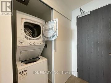 Toronto (Church-Yonge Corridor) condo for rent - A white oven and microwave are installed in a kitchen.