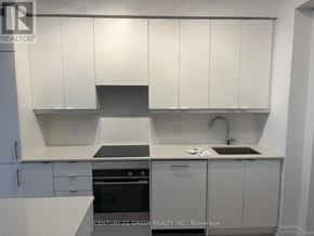 Mississauga (City Centre) condo for rent - A kitchen with white cabinets and a sink.