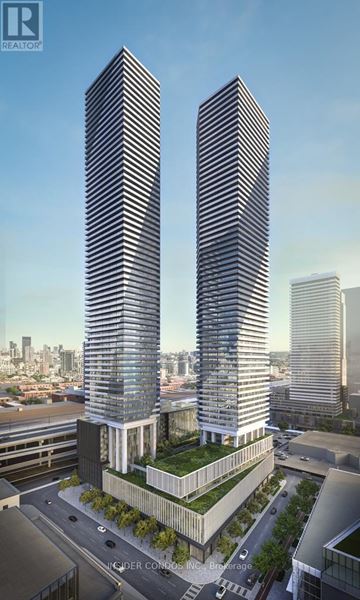 Toronto (Waterfront Communities) condo for rent - Two tall buildings with a green space in between them.