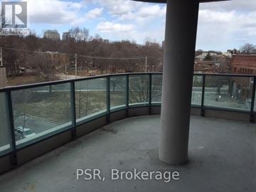 Toronto (Casa Loma) house for rent - A balcony with a view of a cityscape and trees.