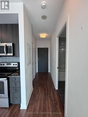Toronto (Mount Pleasant West) condo for rent - A kitchen with a stove top oven and microwave.