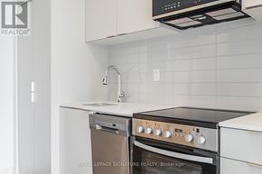 Toronto (West Hill) condo for rent - A modern kitchen with a dishwasher and oven.