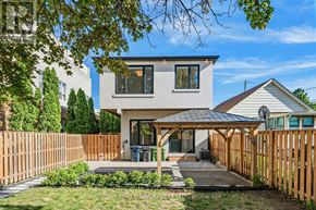 Toronto (Birchcliffe-Cliffside) apartment for rent - A modern house with a wooden fence in front.