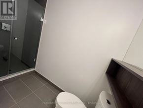 Toronto (Waterfront Communities) condo for rent - A bathroom with a toilet and a sink.
