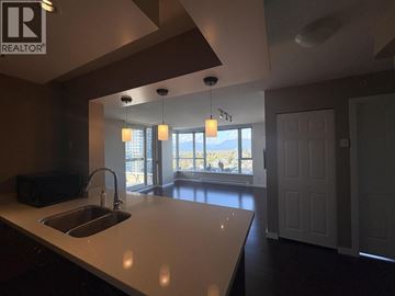 Vancouver apartment for rent - A kitchen with a sink and a window.
