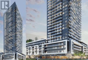 Mississauga (Hurontario) condo for rent - A modern building with a glass facade is depicted in the image.
