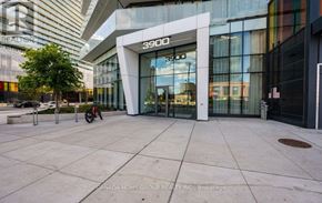 Mississauga (City Centre) condo for rent - The entrance to a building with the number 3900 on it.