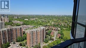 Mississauga (Mississauga Valleys) condo for rent - A view from a high-rise building looking out over a residential area.
