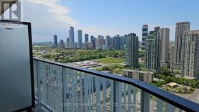 Mississauga (Mississauga Valleys) condo for rent - A balcony view of a city skyline with a sign that reads "REALTOR".