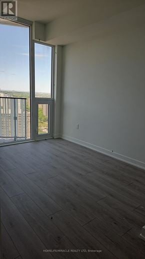 Mississauga (Mississauga Valleys) condo for rent - A room with a view of a balcony and a balcony door.