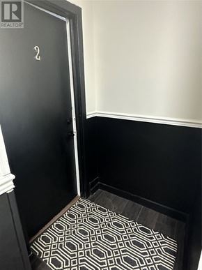 St. John's apartment for rent - A black door with a number 2 on it.