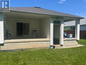 Oakville (Co Central) apartment for rent - A small house with a porch and a bicycle on the left.