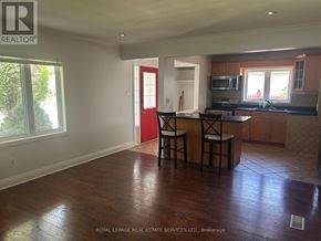 Oakville (Co Central) apartment for rent - A kitchen with a bar stool and a counter.