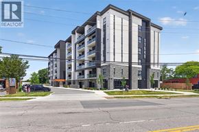 Windsor condo for rent - A modern apartment building with a clear blue sky in the background.