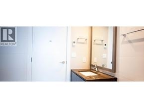 Burnaby apartment for rent - A bathroom with a sink and mirror.