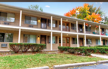 Westland apartment for rent - A building with a brown brick facade and white trim.