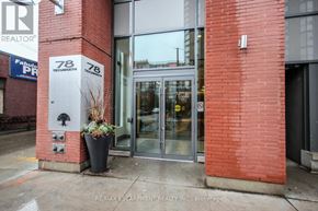 Toronto (Niagara) condo for rent - The entrance to a building with a glass door and a sign that reads "78 Tecumseh".