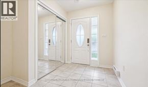 Milton (Fo Ford) townhouse for rent - A hallway with two doors and a window.
