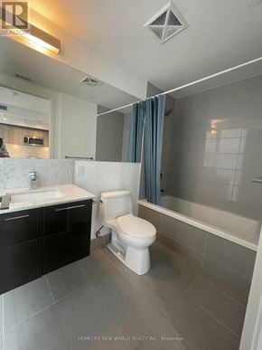 Toronto (Church-Yonge Corridor) condo for rent - A bathroom with a white toilet and a sink.